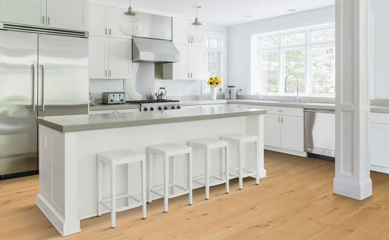 grey quartz countertops in modern white kitchen